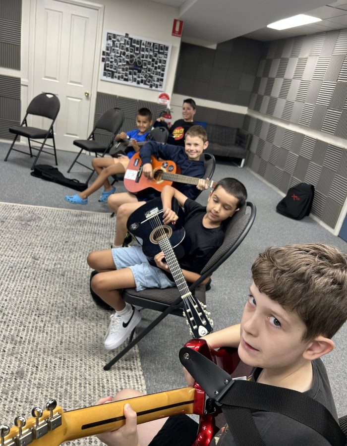 Group Guitar Lessons Learn From Others